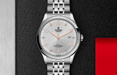 TUDOR 1926 displayed in a flat lay view emphasizing its design and craftsmanship.