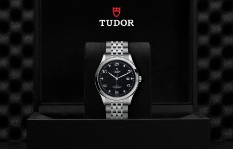TUDOR 1926 nestled in its presentation box, symbolizing the watch's premium status.