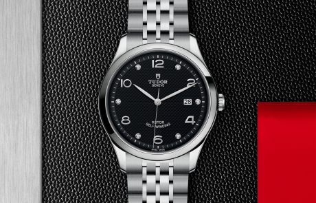 TUDOR 1926 displayed in a flat lay view emphasizing its design and craftsmanship.