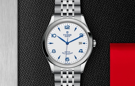 TUDOR 1926 displayed in a flat lay view emphasizing its design and craftsmanship.