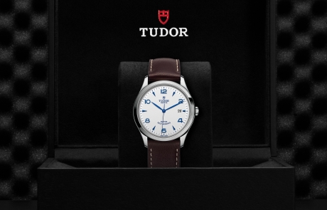 TUDOR 1926 nestled in its presentation box, symbolizing the watch's premium status.