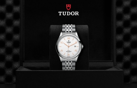 TUDOR 1926 nestled in its presentation box, symbolizing the watch's premium status.