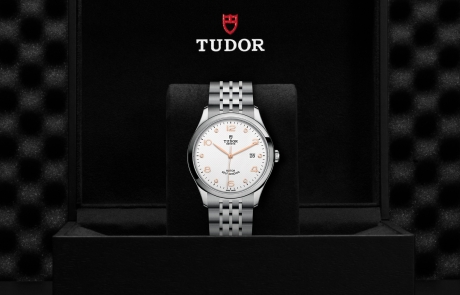 TUDOR 1926 nestled in its presentation box, symbolizing the watch's premium status.