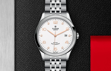 TUDOR 1926 displayed in a flat lay view emphasizing its design and craftsmanship.