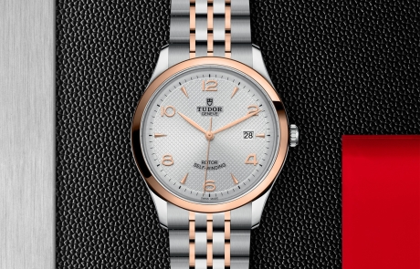TUDOR 1926 displayed in a flat lay view emphasizing its design and craftsmanship.