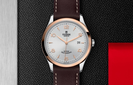 TUDOR 1926 displayed in a flat lay view emphasizing its design and craftsmanship.