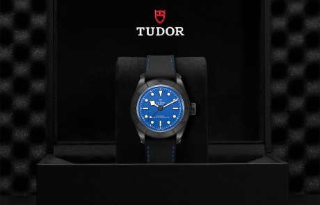 TUDOR BLACK BAY nestled in its presentation box, symbolizing the watch's premium status.