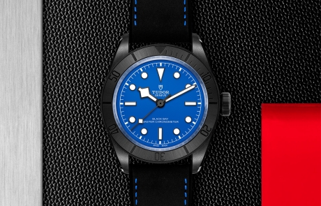 TUDOR BLACK BAY displayed in a flat lay view emphasizing its design and craftsmanship.