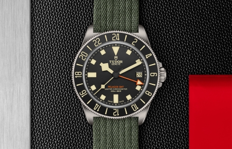 TUDOR PELAGOS FXD displayed in a flat lay view emphasizing its design and craftsmanship.