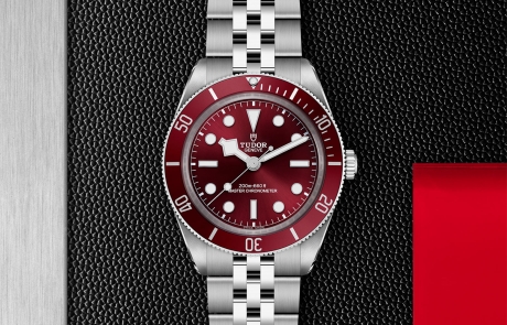 TUDOR BLACK BAY 58 displayed in a flat lay view emphasizing its design and craftsmanship.