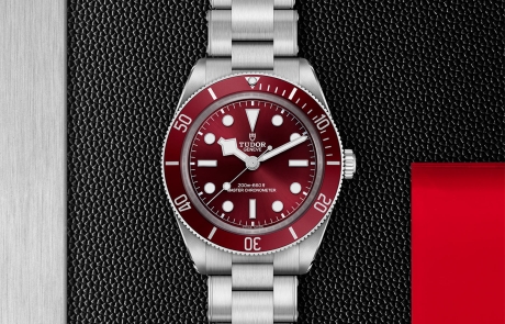 TUDOR BLACK BAY 58 displayed in a flat lay view emphasizing its design and craftsmanship.