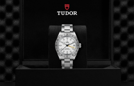 TUDOR BLACK BAY PRO nestled in its presentation box, symbolizing the watch's premium status.