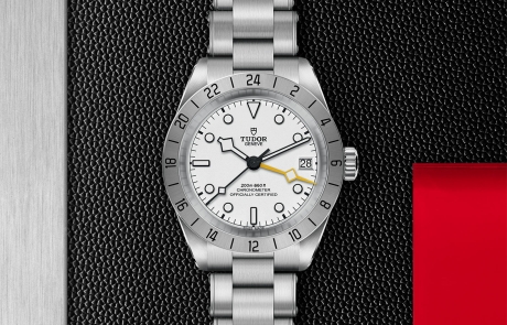 TUDOR BLACK BAY PRO displayed in a flat lay view emphasizing its design and craftsmanship.