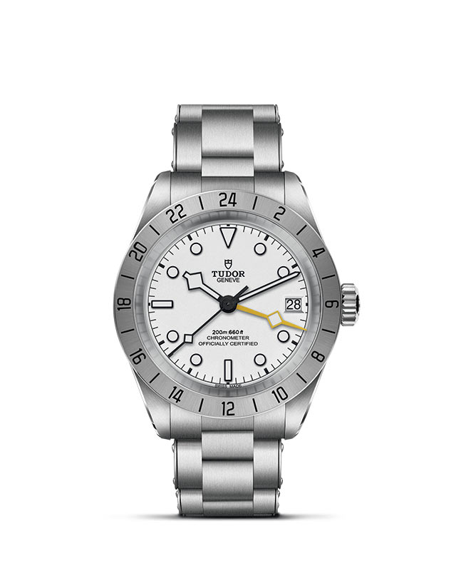 TUDOR BLACK BAY PRO presented upright against a white grid, focusing on its refined aesthetics.