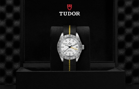 TUDOR BLACK BAY PRO nestled in its presentation box, symbolizing the watch's premium status.