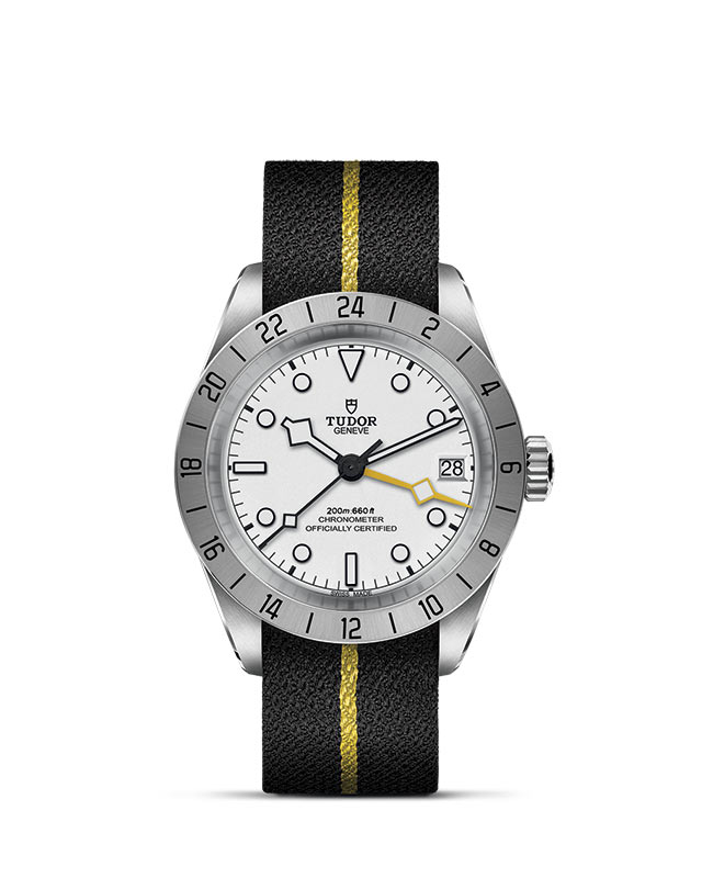 TUDOR BLACK BAY PRO presented upright against a white grid, focusing on its refined aesthetics.