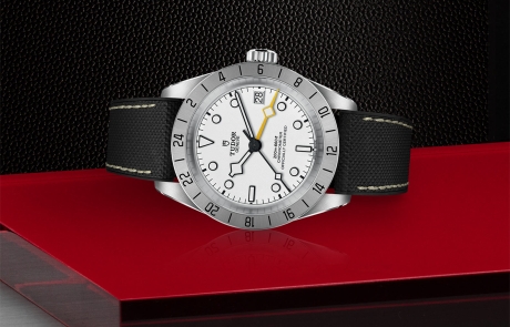 TUDOR BLACK BAY PRO laid down showcasing the opaline, domed dial and overall elegance.