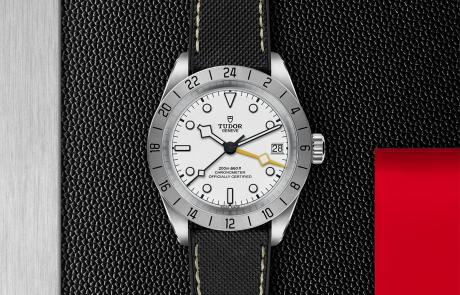 TUDOR BLACK BAY PRO displayed in a flat lay view emphasizing its design and craftsmanship.