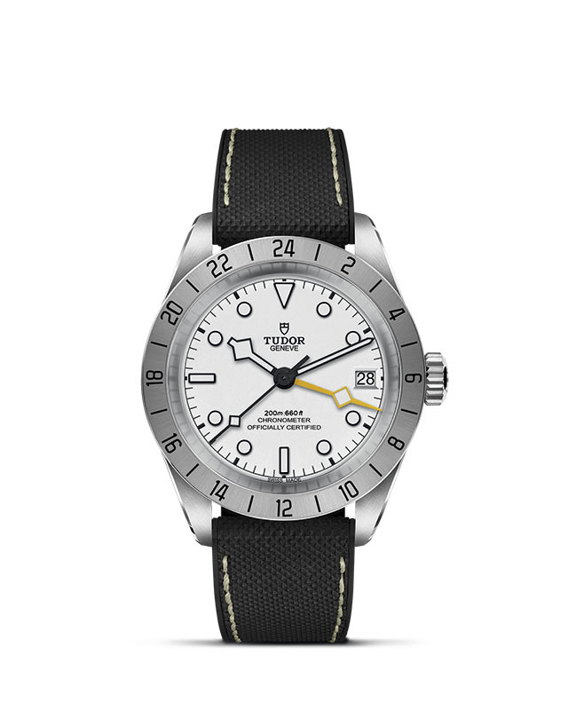 TUDOR BLACK BAY PRO presented upright against a white grid, focusing on its refined aesthetics.