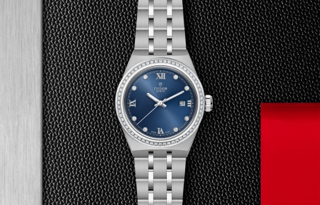 TUDOR TUDOR ROYAL displayed in a flat lay view emphasizing its design and craftsmanship.
