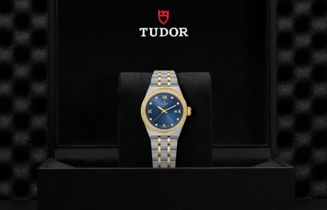 TUDOR TUDOR ROYAL nestled in its presentation box, symbolizing the watch's premium status.