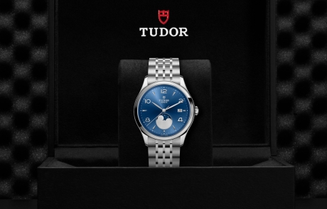 TUDOR 1926 nestled in its presentation box, symbolizing the watch's premium status.