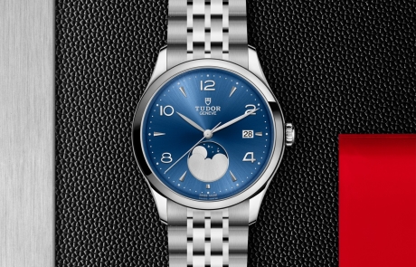 TUDOR 1926 displayed in a flat lay view emphasizing its design and craftsmanship.
